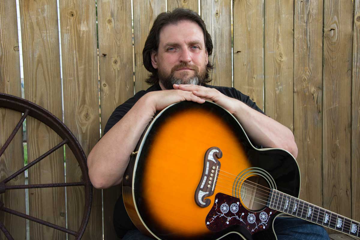 Mitch Ross - Canadian Songwriter - Musician - Guitar Player - Producer with his Epiphone EJ-200SCE